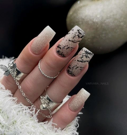 Marble effect nail design with white, blue, and silver festive shades, sophisticated New Year's look 2025 Marble effect nail design with white, blue, and silver festive shades, sophisticated New Year's look 2025
